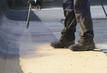 Coating systems over Gainesville spray foam roof systems